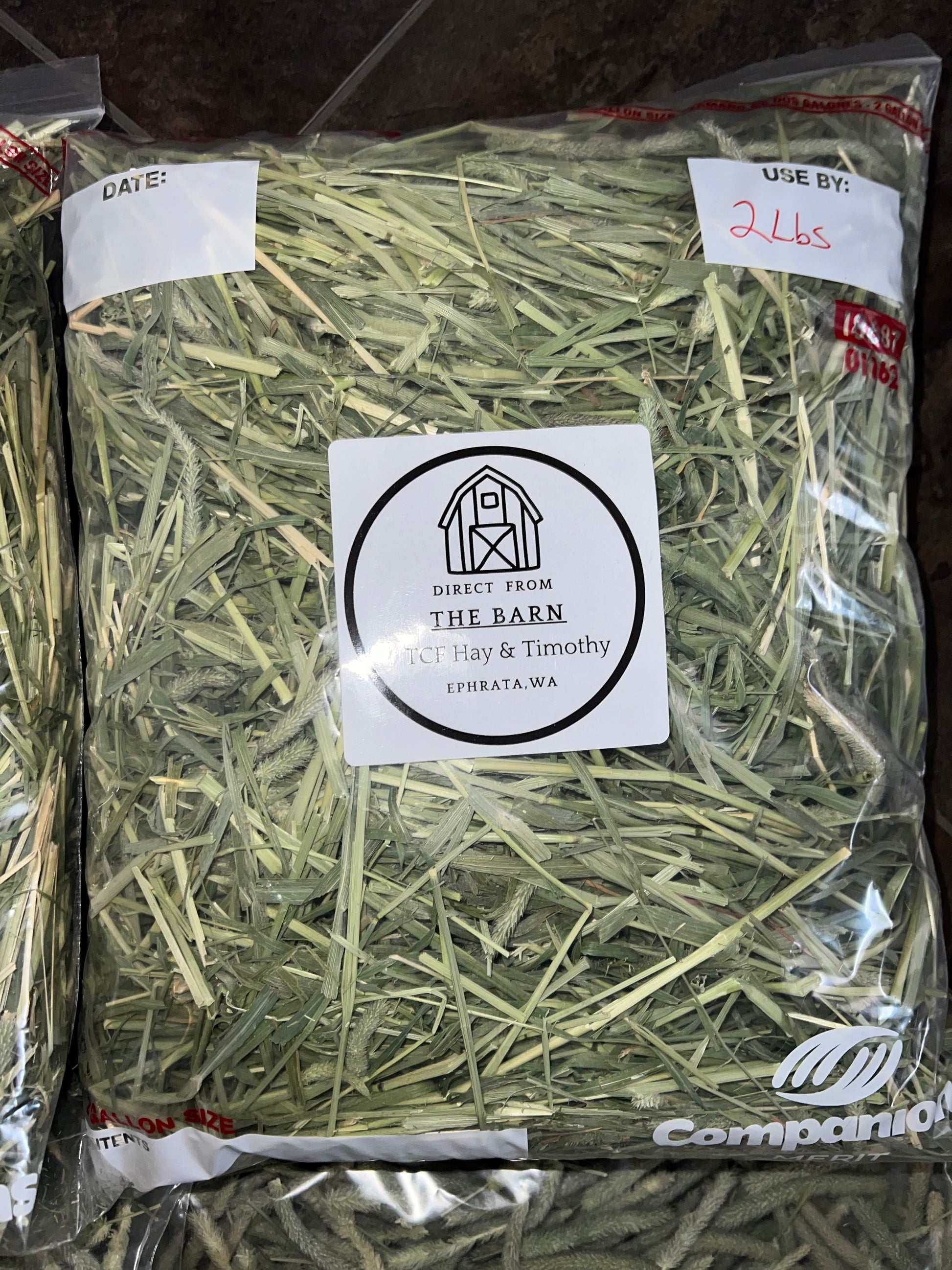 2 lb bag of TCF Hay & Timothy hay from The Barn, Ephrata, WA in clear plastic packaging