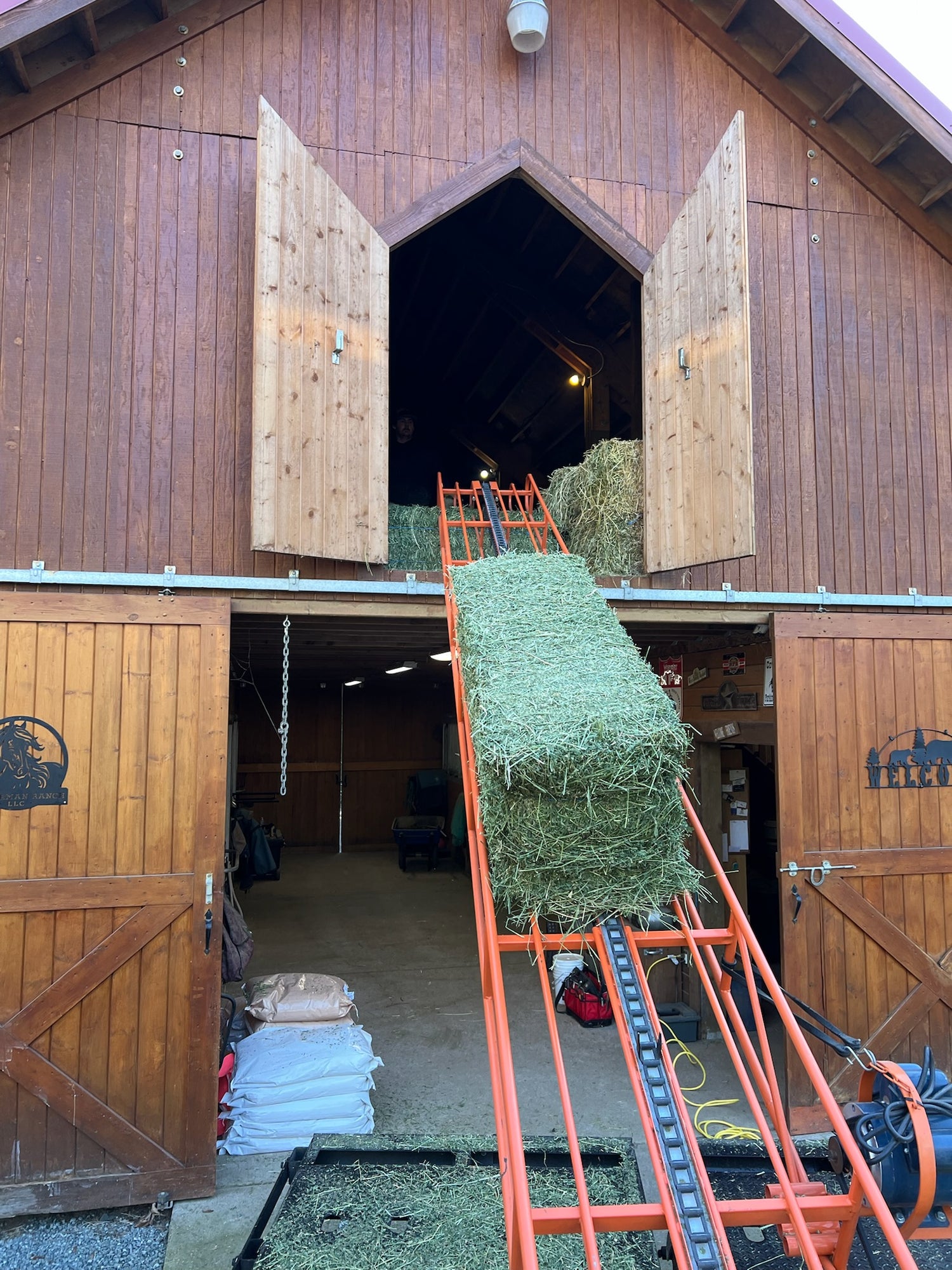 Timothy Hay being elevated into a barn